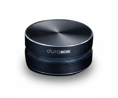 Black circular object with 'duraMOBI' branding on a white background